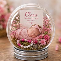 Personalized newborn baby fillable ornament keepsake featuring baby's photo, birth statistics, flowers, and nursery décor ideas.