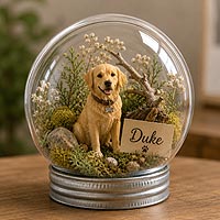 Decorative fillable ornament pet keepsake celebrating a cherished family dog with botanical accents and personalized name tag.