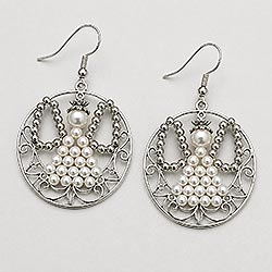 Silver and white pearl angel earrings made with beads and round filigree findings, a beaded angel jewelry pattern for Christmas earrings, pendants and charms.