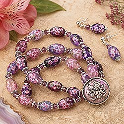 Unique bracelets and earrings set made with beads and buttons that you can make yourself with this free beaded jewelry pattern. Image features 3 strands using colorful beads.